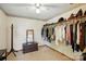 Walk-in closet featuring a mounted clothing rack and a dark wood decorative mirror at 1119 Palmyra Dr, Fort Mill, SC 29708