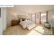Spacious primary bedroom with neutral colors, a large bed, and plenty of natural light at 119 Rustling Waters Dr, Mooresville, NC 28117