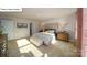 Comfortable primary bedroom with neutral tones, plush carpeting, and modern furnishings at 119 Rustling Waters Dr, Mooresville, NC 28117