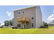 Exterior showcasing a spacious backyard with a wooden deck and green lawn at 119 Rustling Waters Dr, Mooresville, NC 28117