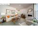 Comfortable living room with a fireplace, neutral decor, and ample seating at 119 Rustling Waters Dr, Mooresville, NC 28117