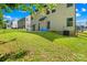 Spacious backyard with green grass and mature trees, perfect for outdoor activities at 120 Carolinian Dr, Statesville, NC 28677
