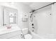 Bathroom view with tiled shower-tub combination and vanity at 120 Carolinian Dr, Statesville, NC 28677