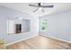 Bedroom with wood floors, ceiling fan, and lots of natural light at 120 Carolinian Dr, Statesville, NC 28677