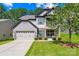 Charming two-story home with a two car garage, a front porch, and a well-manicured lawn at 120 Carolinian Dr, Statesville, NC 28677