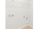 Image of laundry room with tile floor and white painted walls at 120 Carolinian Dr, Statesville, NC 28677