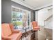 Elegant living room with hardwood floors, large windows, and stylish furniture at 120 Carolinian Dr, Statesville, NC 28677