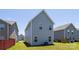 View of backyard with green grass on a sunny day at 12548 Gotland Rd # 327, Midland, NC 28107