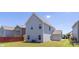 Backyard of home with fence and green grass at 12548 Gotland Rd # 327, Midland, NC 28107