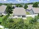 The property features a backyard, patio, and privacy from mature landscaping that offers private outdoor space at 15120 Cavanshire Trl, Charlotte, NC 28278