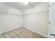 Walk-in closet features carpeted flooring, wire shelving, and bright lighting at 15120 Cavanshire Trl, Charlotte, NC 28278