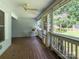 Covered back porch with room for dining or relaxing, and a view of the fenced backyard at 170 Eagle Dr, Salisbury, NC 28144