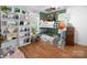 Fun bedroom with a bunk bed, colorful decor, and hardwood floors at 170 Eagle Dr, Salisbury, NC 28144