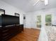 Bright bedroom with hardwood floors, walkout to the back yard, and large dresser at 170 Eagle Dr, Salisbury, NC 28144