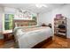 Serene bedroom boasts hardwood floors, soft lighting, and soothing decor at 170 Eagle Dr, Salisbury, NC 28144