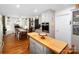 Spacious kitchen with updated appliances, large island, and adjacent dining area at 170 Eagle Dr, Salisbury, NC 28144