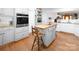 Well-appointed kitchen with butcher block island, stainless oven and ample counter space at 170 Eagle Dr, Salisbury, NC 28144