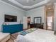 Spacious main bedroom with a television, a ceiling fan, and plenty of storage at 17709 Sedona Way, Cornelius, NC 28031