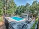 Resort-style pool with ample lounge chairs and a nearby clubhouse, perfect for relaxation at 17709 Sedona Way, Cornelius, NC 28031