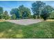 Well-maintained sand volleyball court surrounded by lush greenery, perfect for recreation at 17709 Sedona Way, Cornelius, NC 28031