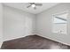 Bright bedroom with hardwood floors and a window with views of the outdoors at 18568 Mainsail Ct, Lancaster, SC 29720