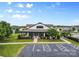 Clubhouse featuring well manicured landscaping and ample parking with a pool and tennis court nearby at 18568 Mainsail Ct, Lancaster, SC 29720