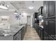 Well-appointed kitchen with a large island, granite countertops, stainless steel appliances, and ample cabinet space at 18568 Mainsail Ct, Lancaster, SC 29720