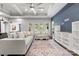 Bright, open living room with tray ceilings, hardwood floors, and French doors leading to the outdoors at 18568 Mainsail Ct, Lancaster, SC 29720