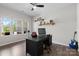 A cozy office with hardwood floors, natural light, and workspace at 18568 Mainsail Ct, Lancaster, SC 29720