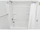 Simple bathroom with white fixtures and tiled shower space at 2726 Tranquil Oak Pl, Charlotte, NC 28206