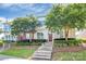 Charming townhome exterior with well-maintained landscaping and inviting entrance stairs at 2726 Tranquil Oak Pl, Charlotte, NC 28206