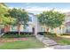 Charming townhome with a well-manicured lawn and mature trees, situated in a peaceful community at 2726 Tranquil Oak Pl, Charlotte, NC 28206