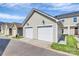 Detached two car garage, with two garage doors, offering ample parking at 2726 Tranquil Oak Pl, Charlotte, NC 28206