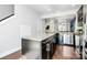 Bright kitchen showcasing granite countertops, stainless steel appliances, and open floorplan at 2726 Tranquil Oak Pl, Charlotte, NC 28206