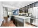 Well-equipped kitchen with granite countertops, stainless steel appliances, and ample cabinet space at 2726 Tranquil Oak Pl, Charlotte, NC 28206