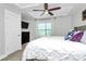 Spacious bedroom with tray ceiling, ceiling fan, and carpeted floors at 2726 Tranquil Oak Pl, Charlotte, NC 28206