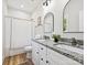 Bathroom featuring a double sink vanity with granite countertops and a shower with patterned curtain at 286 Old Pinckney Rd, York, SC 29745