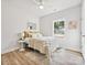 Bedroom with ceiling fan, window, light walls and tastefully coordinated decor at 286 Old Pinckney Rd, York, SC 29745