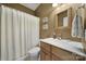 Cozy bathroom with earth-tone walls and a framed mirror at 2909 Julian Glen Cir, Waxhaw, NC 28173