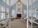 Elegant living room with a fireplace, shuttered windows, and tasteful decor at 2909 Julian Glen Cir, Waxhaw, NC 28173