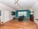 Bonus room with hardwood flooring, recessed lighting, and a cozy seating area at 3401 Cresta Ct, Charlotte, NC 28269