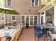 Spacious outdoor deck with a hot tub, dining set, and lush greenery, perfect for entertaining and relaxation at 3401 Cresta Ct, Charlotte, NC 28269