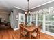 Inviting dining room with natural light and a view to the living room at 3401 Cresta Ct, Charlotte, NC 28269