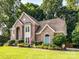 Side view of home with large lawn and professionaly maintained landscaping create exceptional curb appeal at 3401 Cresta Ct, Charlotte, NC 28269