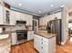Well-equipped kitchen with stainless steel appliances, granite countertops, and a central island at 3401 Cresta Ct, Charlotte, NC 28269