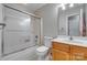 Clean bathroom with a shower-tub combo, toilet, and single vanity sink at 3849 Carl Parmer Dr, Harrisburg, NC 28075