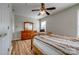 Bedroom featuring hard wood-look floors, a window, and wooden dresser at 3849 Carl Parmer Dr, Harrisburg, NC 28075