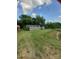 Charming home exterior with blue siding, a front porch, and a neatly mowed lawn at 3913 Stough Sw Rd, Concord, NC 28027