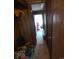 Hallway view featuring wooden wall paneling at 3913 Stough Sw Rd, Concord, NC 28027