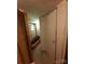 Hallway view featuring a neutral color scheme and closet at 3913 Stough Sw Rd, Concord, NC 28027
